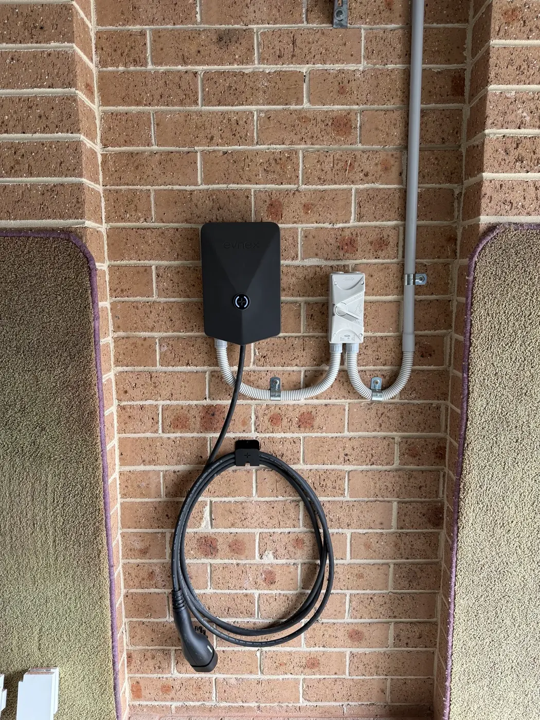 Evnex electric vehicle charger professionally installed by J.A.S Electrical